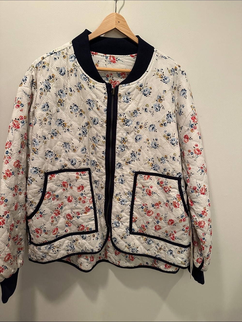 THE GREAT Floral Quilted Bomber Jacket in Cream with Navy Trim
